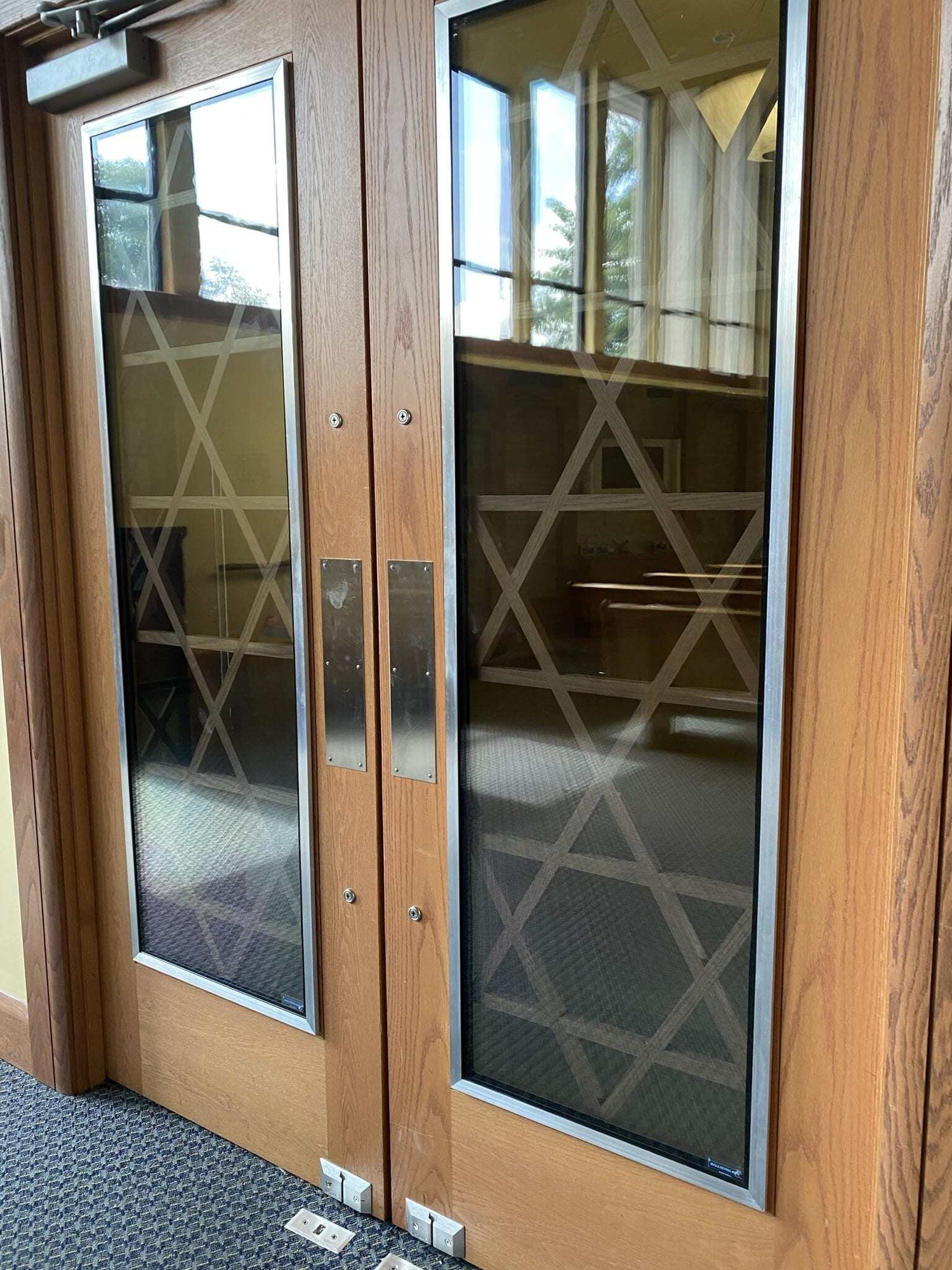 Ballistic retrofit glazing installed in sanctuary entry doors at Temple Kol Tikvah, Parkland.